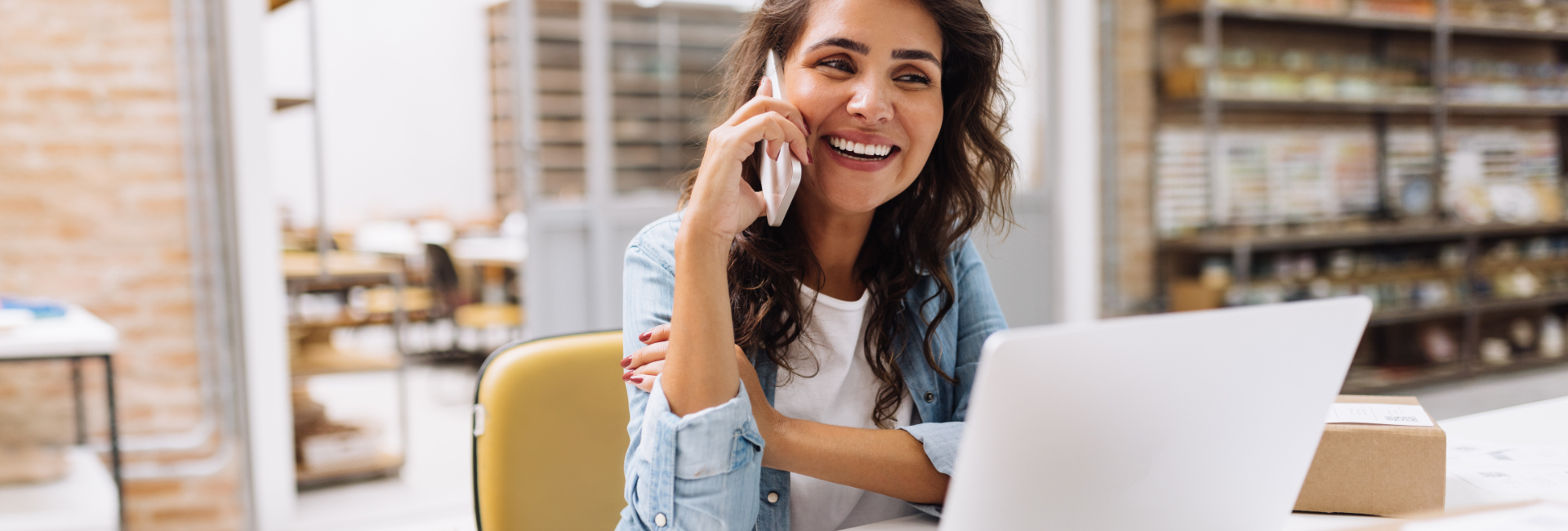 Woman Business Owner Making A Call 1920X650